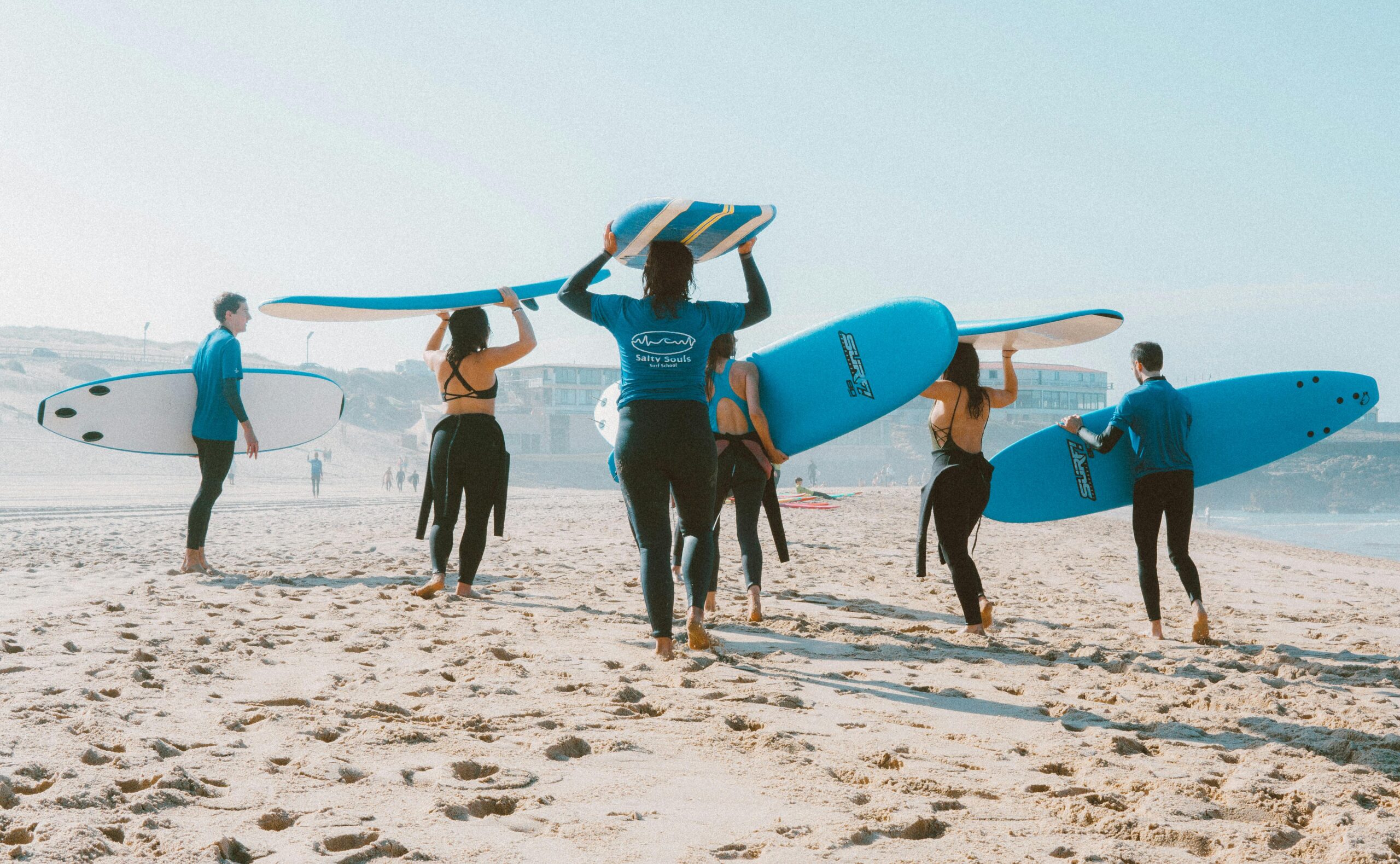 People doing surfing and water activities together